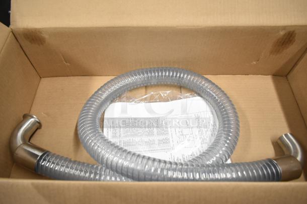 Belshaw Adamatic TG-50 stainless steel thermoglazing station components in box, including a flexible hose and instructions.