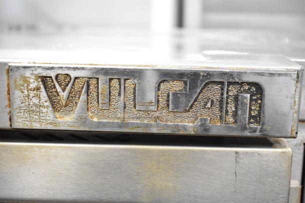 Vulcan commercial convection oven, electric, full-size, view-through doors, thermostatic controls, on commercial casters.