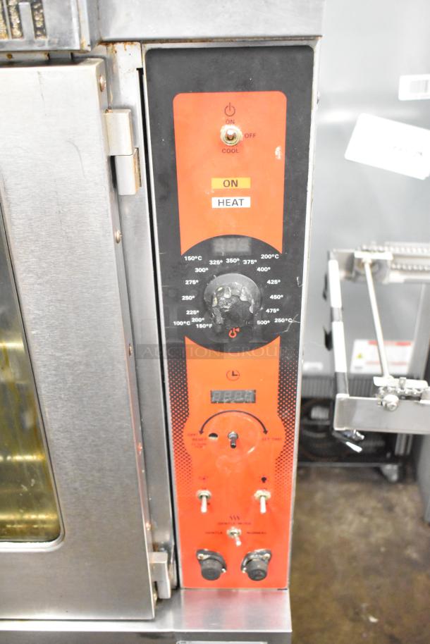 Vulcan commercial convection oven with view-through doors, thermostatic controls, and casters, in used condition.