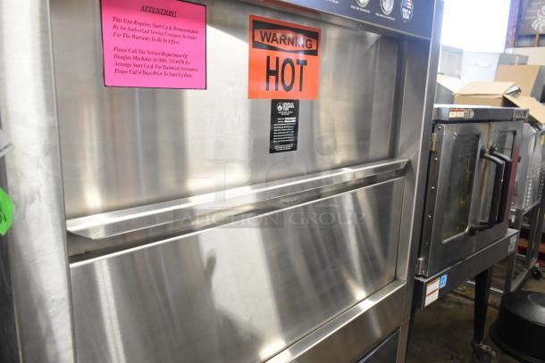 New Douglas SD-20-ELEL Pot and Pan Washer, 480 Volts, 3 Phase. Features "Warning Hot" and warranty labels. Scratch and dent condition.