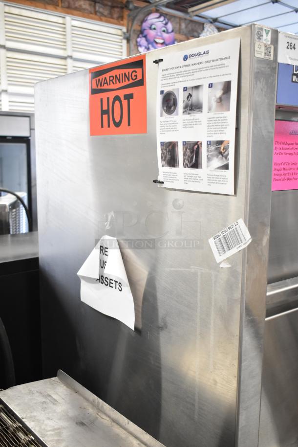 Douglas SD-20-ELEL Commercial Front Load Washer, 2025 model, scratch and dent condition, 480V, 3-phase. Warning labels visible.