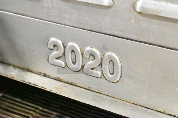 Turbochef HhC2020 oven detail showing model number "2020" on metal exterior, in used condition.
