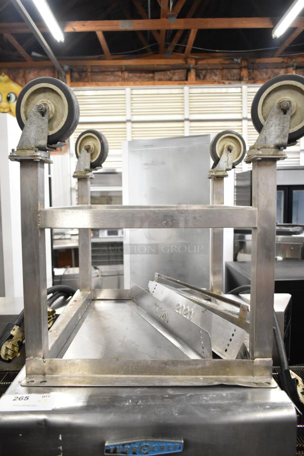 3 Turbochef HhC2020 electric conveyor ovens with equipment stand, stainless steel, 208/240V, 3-phase, tags visible.