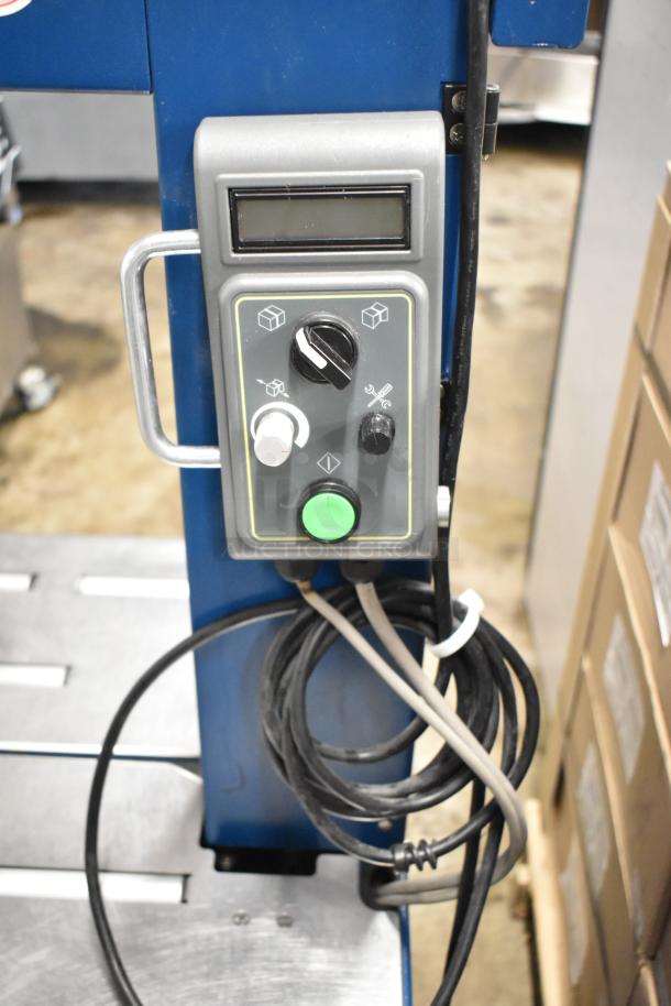 Polychem PC1000 automatic arch strapping machine, blue and grey controls, on casters. 115 volts, 1 phase.