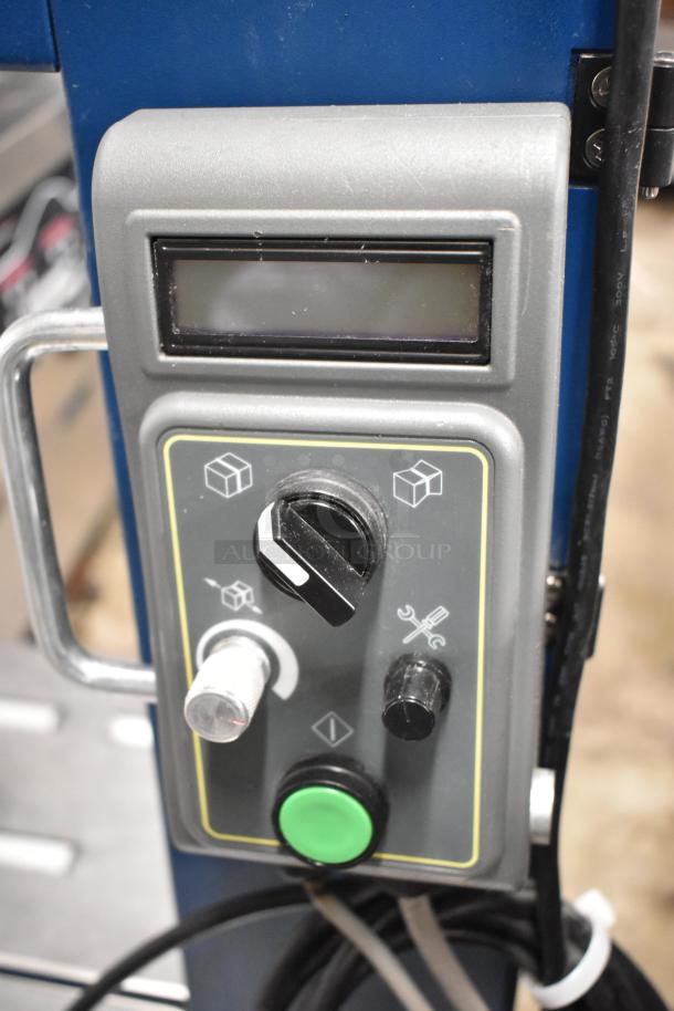 Polychem PC1000 strapping machine control panel, featuring dials and buttons. Used condition, 115V, 1-phase power.