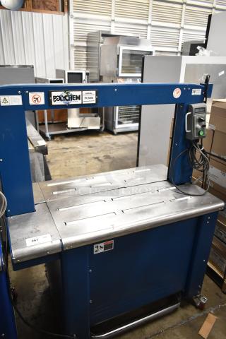 Polychem PC1000 automatic arch strapping machine on casters. Features control panel, labels indicating model, and uses 115V, 1 phase.