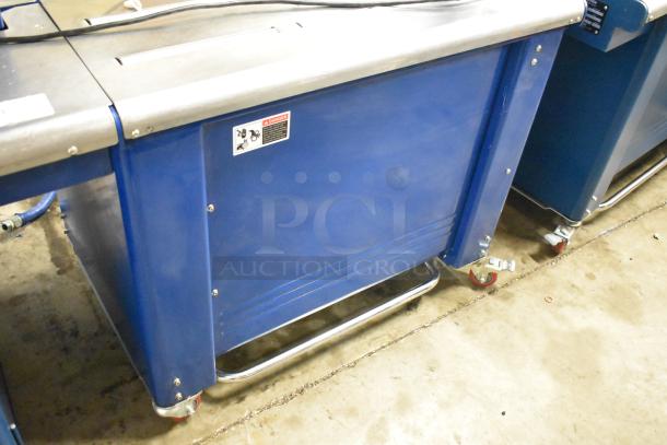 Polychem PC1000 strapping machine, commercial floor style, automatic arch, blue, on casters, features 115V, 1 phase.