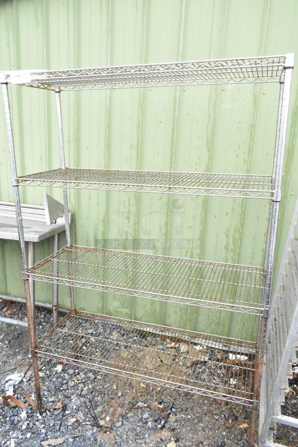 Chrome Finish 4 Tier Wire Shelving Unit, moderate wear, buyer must dismantle, ideal for storage, consider freight charges.