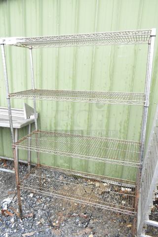 Chrome Finish 4 Tier Wire Shelving Unit, moderate wear, buyer must dismantle, ideal for storage, consider freight charges.