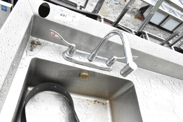 Commercial soda station with water dispenser, sink basin, and under shelves. Slight wear with visible water spots. Model 291 label shown.