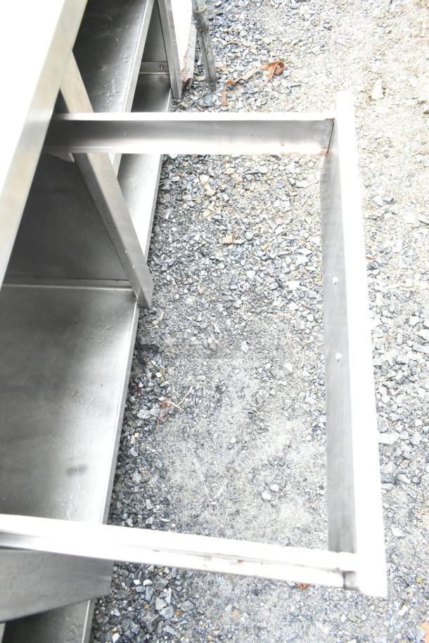 Commercial soda station with water dispenser, stainless steel sink basin, drawer, and under shelves. Good condition.