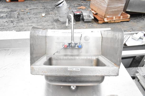 John Boos commercial wall mount hand wash sink with faucet, dual handles, and side splash guards. "Hand Sink" label. Used condition.