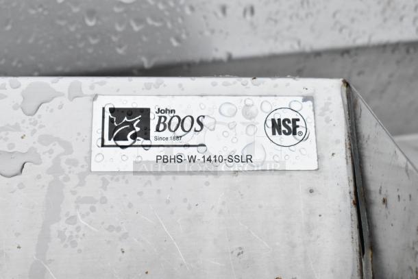 John Boos commercial hand wash sink label, model PBHS-W-1410-SSLR. Features NSF certification, visible water droplets.