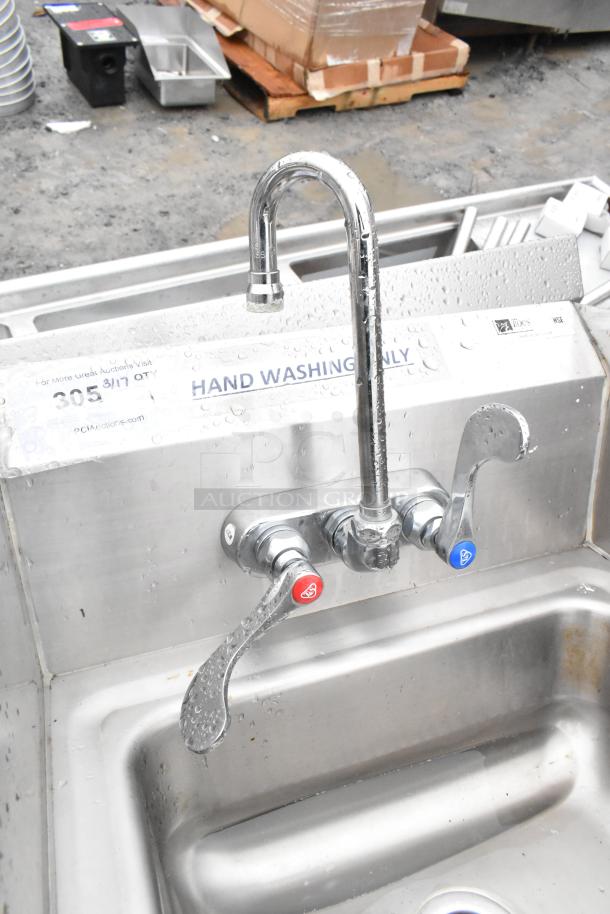 John Boos commercial hand wash sink with faucet and side splash guards. Includes labeled handles for hot and cold water.