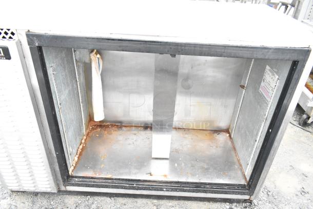 Continental BBUC50S-SS-SGD commercial back bar cooler, missing doors, visible wear and rust, 115 volts, 1 phase.