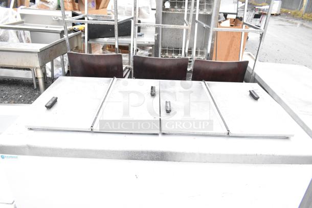 Excellence HFF-8-HC commercial chest freezer with two center hinge lids. 115 volts, 1 phase, visible branding.