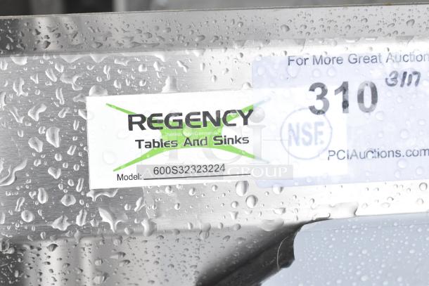 Regency 600S32323224 commercial 3-bay sink with dual drain boards; brand new with minor scratches and dents.