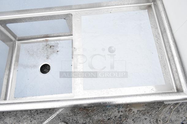 Brand new Regency 600S32323224 commercial 3 bay sink with dual drain boards, slight scratches, stainless steel.