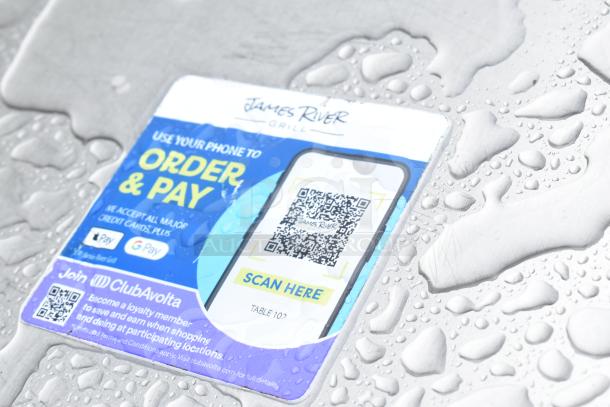 2 bar height tables with sturdy black bases, water-resistant surface, includes QR code for order and pay functionality.