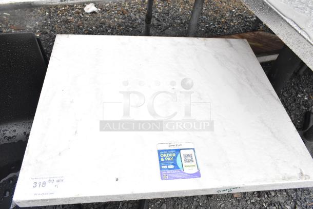 Dining height table with a white rectangular top on a sturdy black base. Features a QR code label and "318 QTY" marking. Suitable for outdoor use.