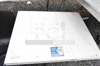 Dining height table with a white rectangular top on a sturdy black base. Features a QR code label and "318 QTY" marking. Suitable for outdoor use.