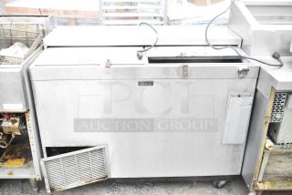 Perlick 7260E-SIL-UL commercial back bar bottle cooler with 2 sliding lids, on casters. 115 volts, 1 phase, visible wear and rust.