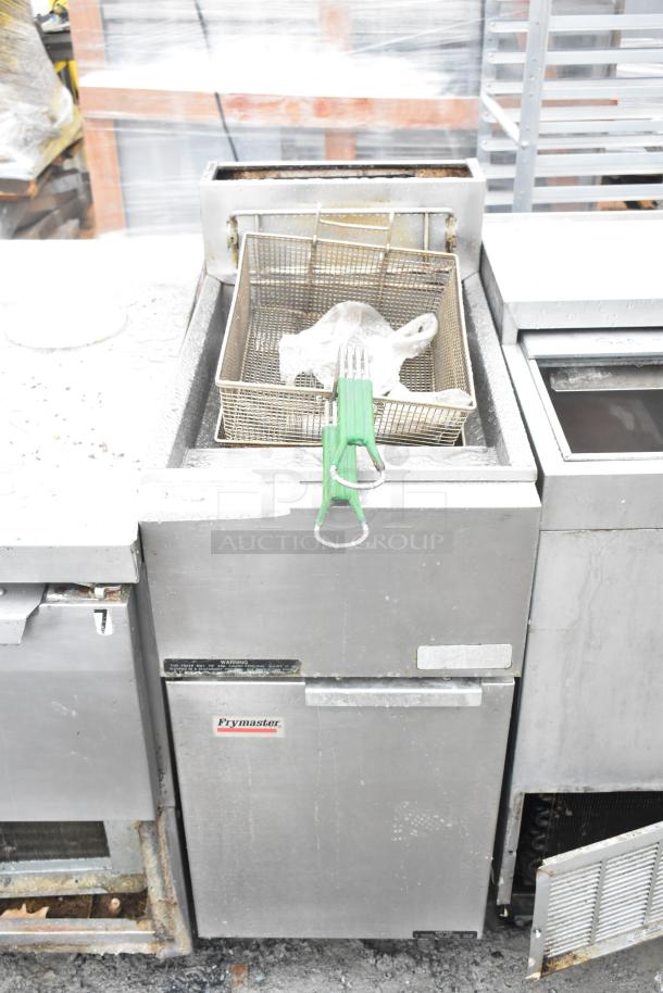 Frymaster GF14SD commercial deep fat fryer with metal fry basket. Natural gas powered, 105,000 BTU, floor style.