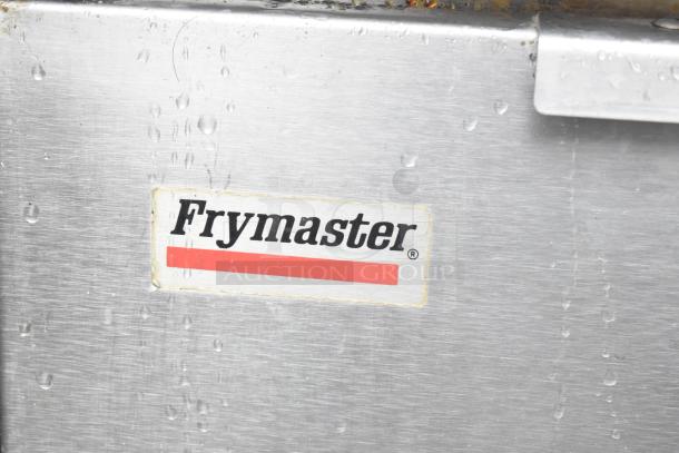 Frymaster GF14SD commercial deep fat fryer with metal basket, 105,000 BTU. Visible branding label with slight wear.