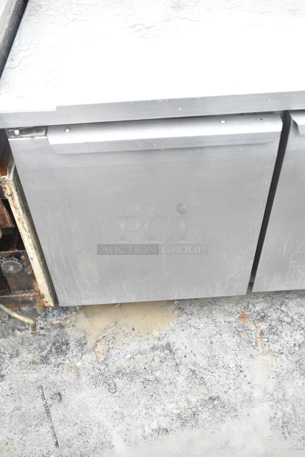 Continental CRA68 3-door undercounter cooler, stainless steel finish, 115V, 1 phase; condition appears used.