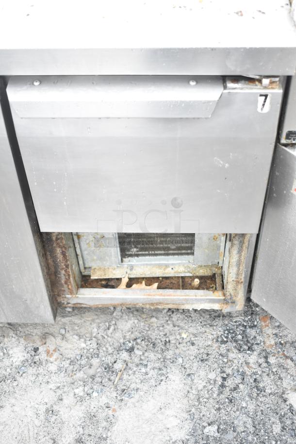 Continental CRA68 3 Door Undercounter Cooler, 115V, 1 Phase. Shows signs of rust and wear, needs maintenance.