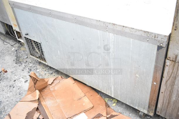 Continental CRA68 Commercial 3 Door Undercounter Cooler, 115 Volts, 1 Phase, visible wear on exterior.