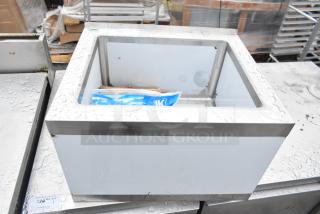 BRAND NEW Regency 600SM162012 mop sink, 25" 16-gauge stainless steel, 20"x16"x12" bowl, visible dents, one compartment.