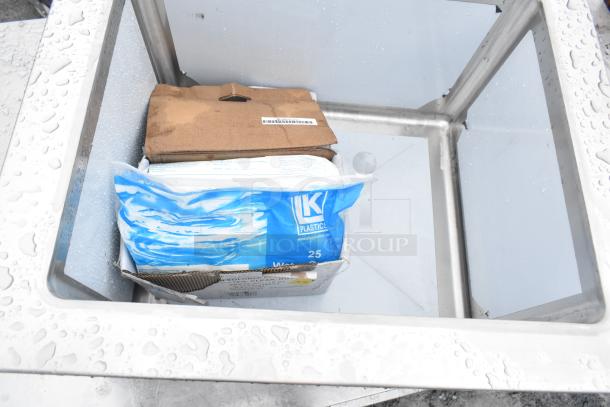 Brand new Regency 25" stainless steel mop sink, 16-gauge, with minor cosmetic dents. Includes packaging materials.