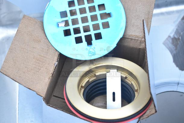 Stainless steel floor mop sink with 20" x 16" x 12" bowl, includes brass drain assembly. Scratch and dent condition.