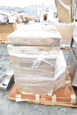 Pallet with new scratch and dent items, including Lavex cart and Steelton shelf kit, wrapped in plastic wrap for auction.