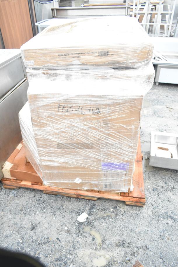 Pallet of 6 new scratch-and-dent items including Lavex cart, Steelton shelf kit, and work table, wrapped in clear plastic.