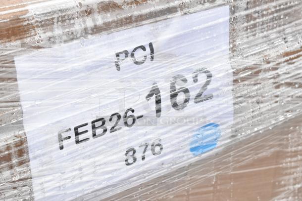 Pallet with plastic wrap labeled "FEB26-162" containing six new scratch-and-dent items: Lavex cart, Steelton shelf kit, work table.