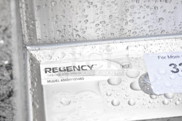 Regency 10"x14"x5" stainless steel drop-in sink, model 600DI110145S, new scratch and dent with NSF label visible.
