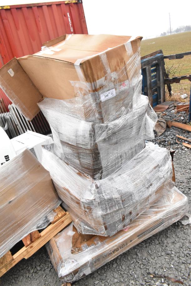 Pallet with five assorted new scratch and dent items wrapped in plastic. Visible label "FEB26-124" indicates auction lot.