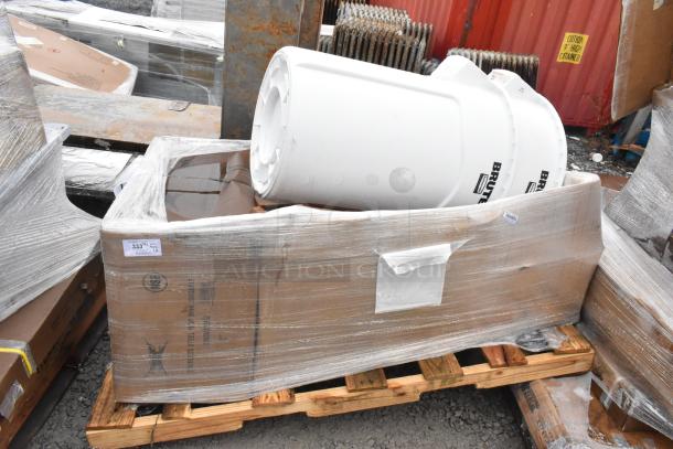 4 new items on pallet: pump motor, sink, mop sink. Visible white Brute container. Wrapped in plastic, marked FEB26-94.