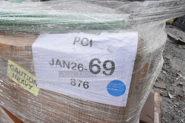 Pallet wrapped in clear plastic, labeled "JAN26-69" and "Caution Heavy," containing 8 new scratch and dent items.