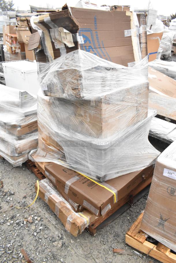 Plastic-wrapped pallet with 8 new items, including a pan rack, work table, and ingredient bins, some boxes labeled "freight."