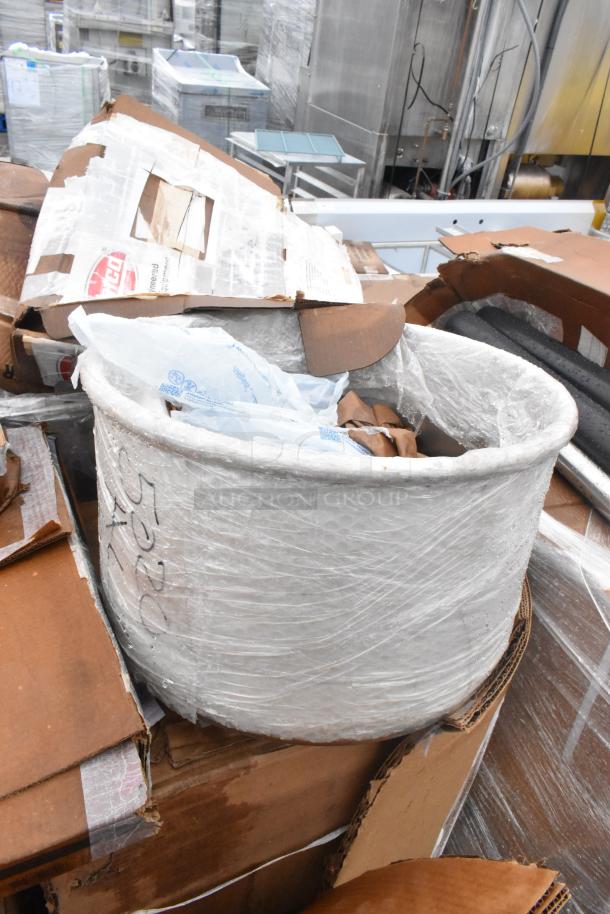 15 brand new scratch and dent items wrapped, including a sink, grease trap. Slight packaging wear visible.