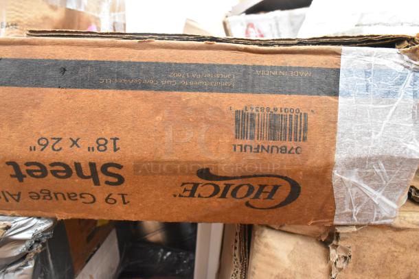 Cardboard box labeled "Choice" with visible barcode and dimensions 18" x 26". Contains scratch and dent items.