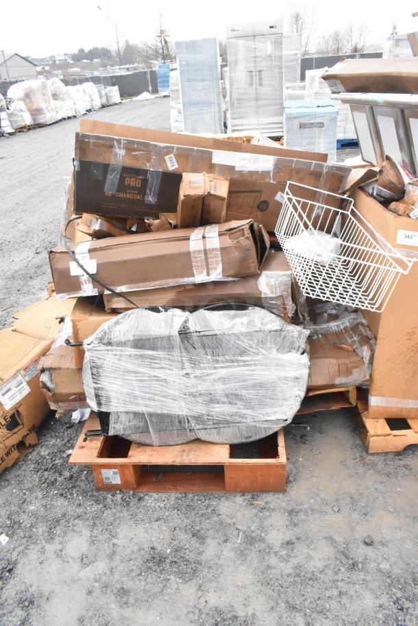 12 brand new scratch and dent items including table base columns, sink, and pot rack on pallets outdoors.