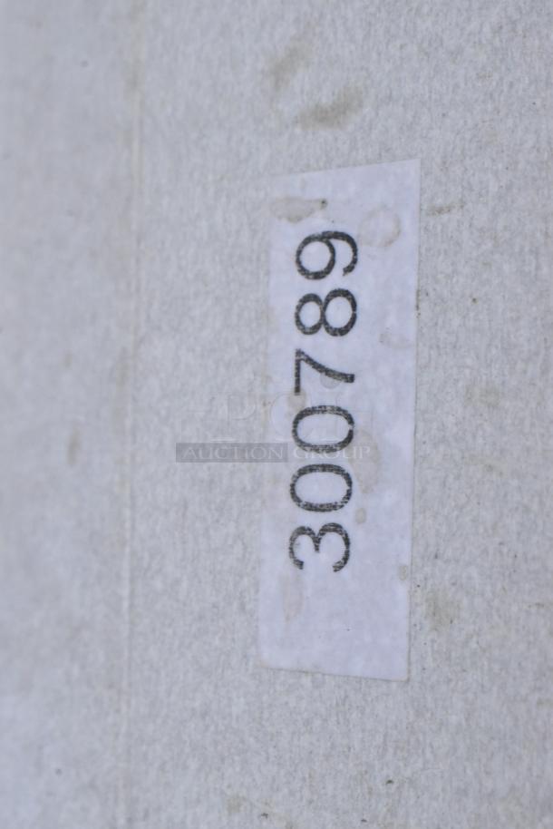 Label with number "300789". Part of a lot including table base columns, sink, and pot rack. Scratch and dent condition.