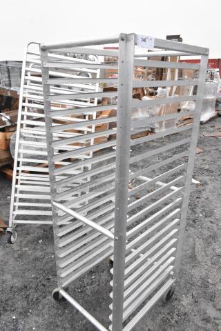 Lockwood RA64-ER18E-S commercial pan transport rack on casters, metal frame, multiple shelves, used condition.