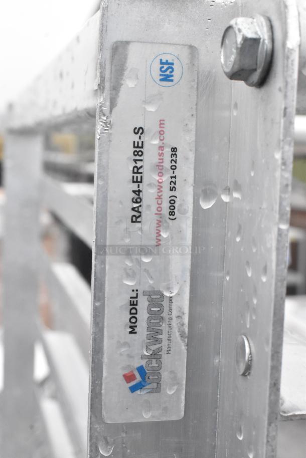 Lockwood RA64-ER18E-S commercial pan transport rack with casters, visible manufacturer label and contact information.