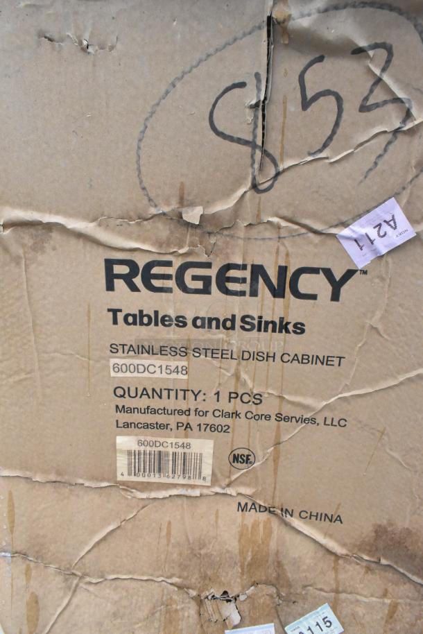 Cardboard packaging for Regency stainless steel dish cabinet, model 600DC1548. Includes product and shipping labels. Box shows wear.