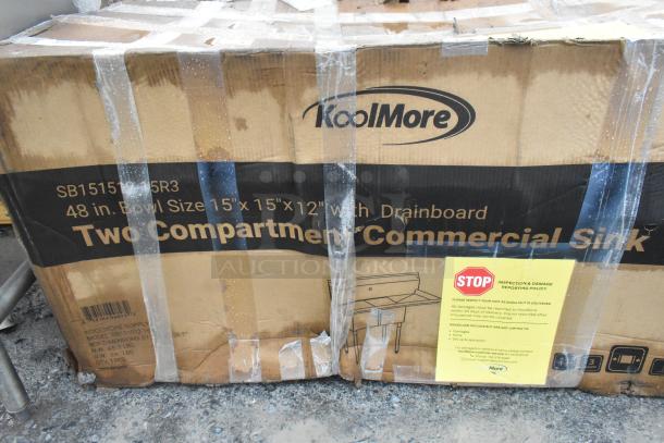 Brand new KoolMore SB151512-15R3 48" two-compartment stainless steel commercial sink with drainboard in box, slight packaging damage.